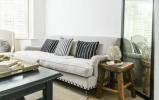 Denne loslitt elegante stuen kombinerer eleganse og komfort